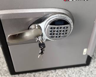 Sentry Safe - has key - combo unknown