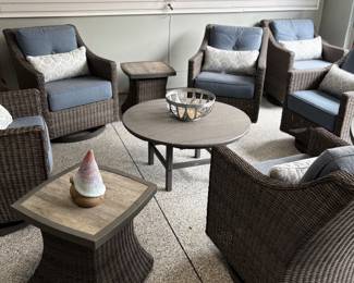 All-season wicker swivel rocking armchairs (5 available), polywood round cocktail table and all-season wicker side tables, Aluminum basket and ceramic gnome
