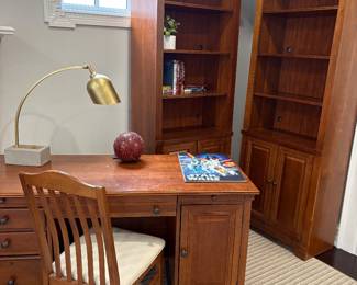Stanley desk with chair, Bookcases with a lower cabinet by Stanley (2 available), brass and metal desk lamp, decor and Vintage Star Wars sign