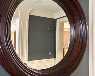 Large round wood framed mirror 