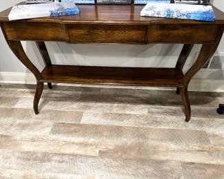 Console table by Sherrill with center drawer and lower tier