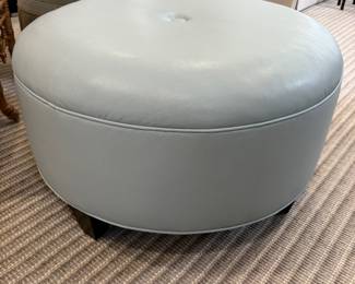 Round "pebbled" leather ottoman - sea foam blue