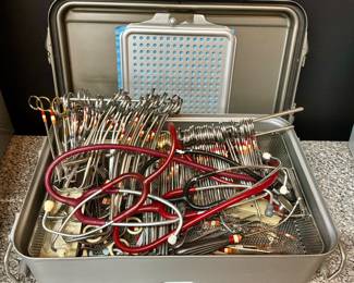 Vintage surgical sterilization case with tools and instruments, vintage stethoscopes 
