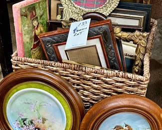 Collection of picture frames, framed ceramic plates