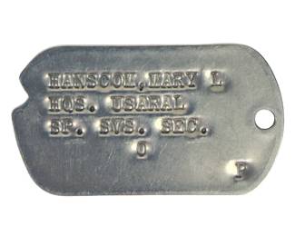 US Military Dog Tag: Mary L. Hanscom, HQS. USARAL, SYS. SEC., SP. O