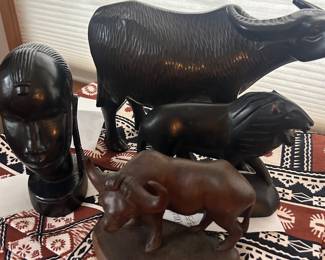 collection of hand carved animals
