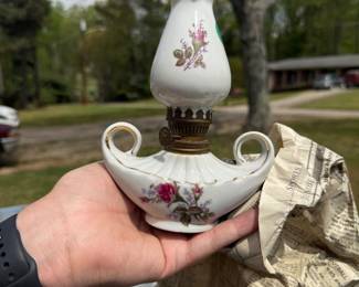 vintage porcelain oil lamp featuring a "Moss Rose" floral pattern