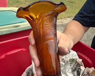 vintage vase is an amber-colored glass piece