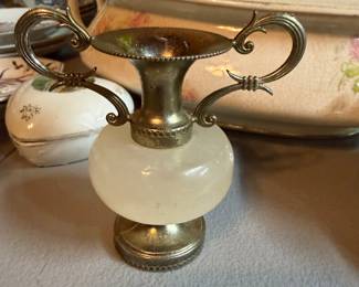 vintage urn-style bud vase featuring a white onyx stone body and ornate brass-plated metal handles and base.