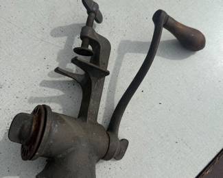 vintage, cast iron hand-crank meat grinder