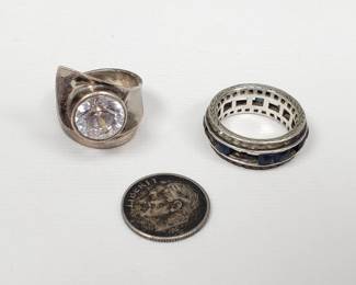 Sterling silver modernist ring with crystal stone, silver ring with glass stones (some missing), and a Roosevelt 1950-S dime