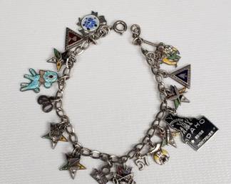 Sterling silver charm bracelet with some sterling charms