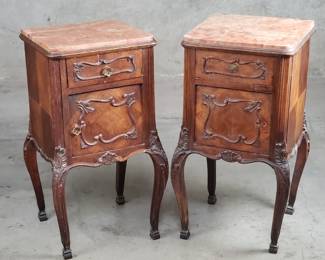 Pair of antique French carved walnut nightstands