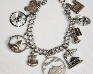 Silver charm bracelet – charms are sterling, 830,