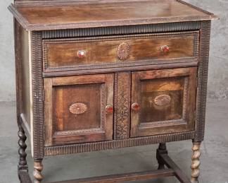 Antique carved oak cabinet with barley twist legs