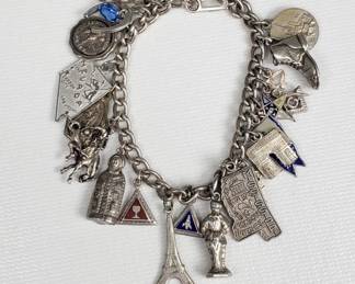 Sterling silver charm bracelet with some sterling
