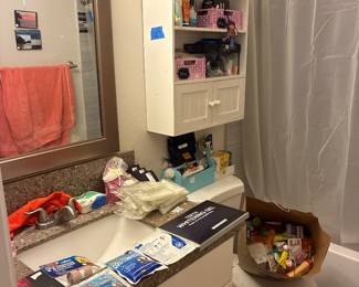 Bathroom supplies, nail polish, ice packs, travel shampoos and conditioners and soaps, sunscreen, Gua Sha kit, creams, 