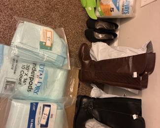 New boots never worn, mattress pads, bed risers , shoes 