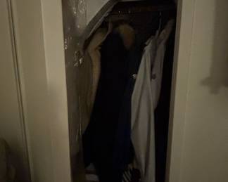 Assorted Clothing and Linens in Closet