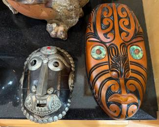 Antique Tibetan turtleshell mask and Maori Mask