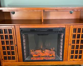 Tv entertainment cabinet with heater forced air