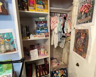 Vintage baby clothes, board games, Polly Pockets from the 90’s, vintage toys