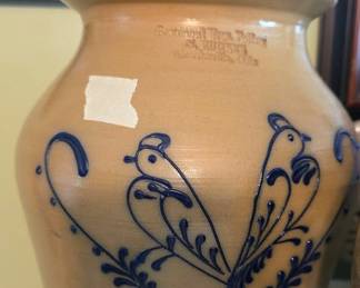 stoneware jar featuring cobalt blue decoration of birds with leafy branches, produced by Beaumont Pottery