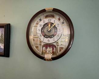 Wall clock musical moving parts