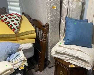 Queen bed, side table and linens