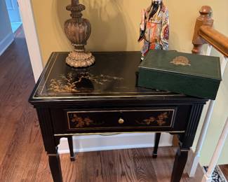 This is a rare cabinet that holds singer sewing machine