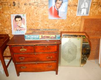 Furniture, door glass, mirror, Elvis signs, railroad track in back right