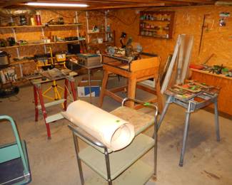 woodworking, reloading table in back right, misc on shelved