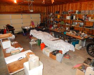 View of garage from entry stairs (checkout table on left)
