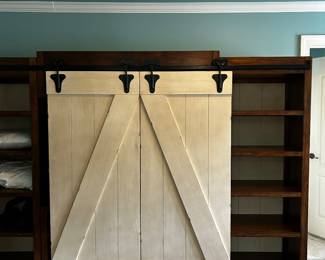 Wardrobe/storage with shelving and barn doors