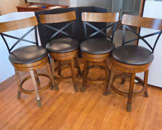 Swiveling Wooden Bar Stools With Black Seats