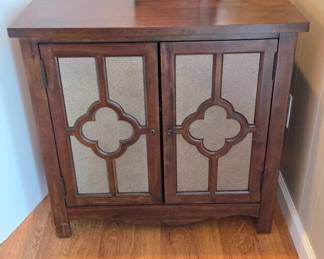 Wooden Cabinet With Decorative Doors