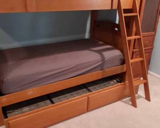 Grant Hill furniture brand bunk set with trundle bed. Sleeps three bed