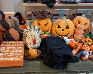 assorted autumn and Halloween-themed home decor items