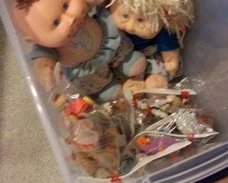 a collection of vintage Cabbage Patch Kids dolls