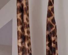and-carved wooden giraffe sculptures,