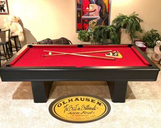 OLHAUSEN red felt billiards pool table with accu-fast cushions. Comes with balls, cues, cue stand, table cover, chalk, triangle, etc. 100“(L) x 56“(W) x 30.5“(H)  
