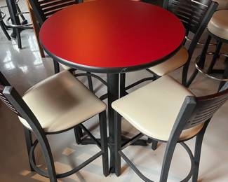 Five high top tables, 10 bar stools, and six bar chairs/stools by MTS Seating (chairs) and Custer (tables).