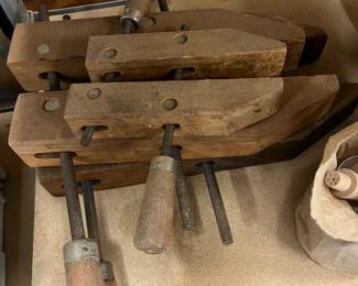 Wooden hand screw clamps.