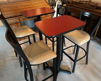 Five high top tables, 10 bar stools, and six bar chairs/stools by MTS Seating (chairs) and Custer (tables).