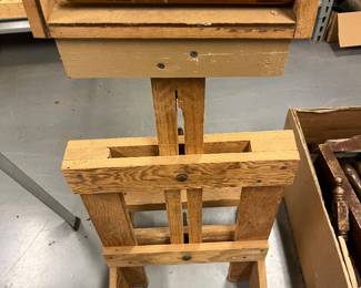 Vintage wood feeder for a table saw.