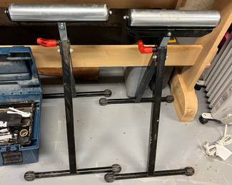 Two Wolfcraft adjustable roller stands.
