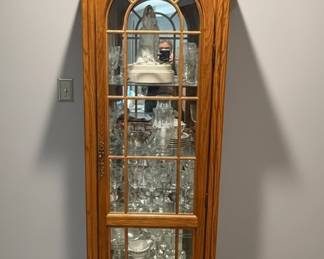 Howard Miller Oak Curio Cabinet