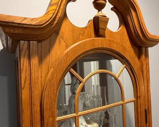 Howard Miller Oak Curio Cabinet