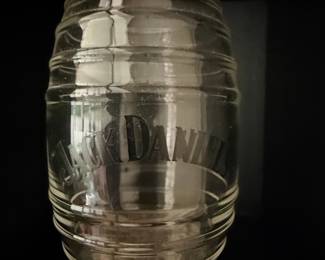 Assorted Shot Glasses and Collectibles Display with Jack Daniel's Barrel Jar