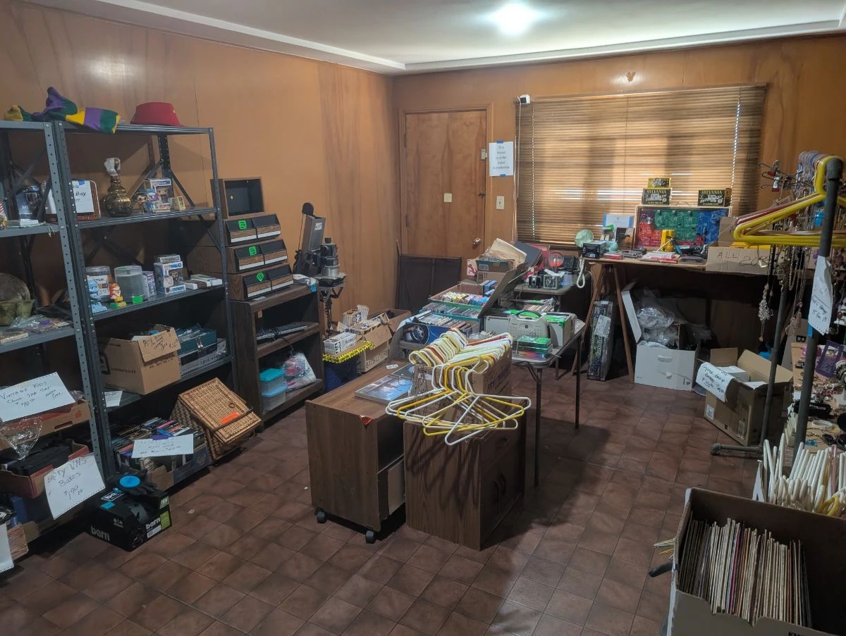 antique photo development supplies and equipment, vintage stamp collection, hangers, jewelry, vinyl records, LPs, household decorations